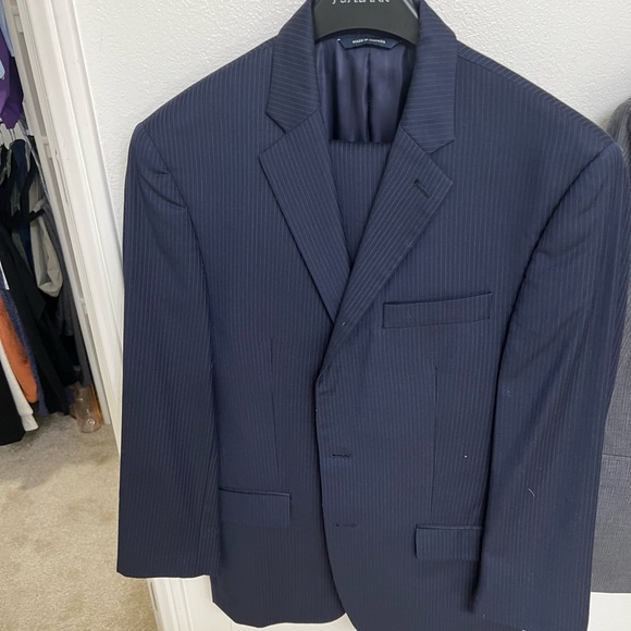 Ralph Lauren navy suit. Jacket is 38 short pants are 30-32 waist